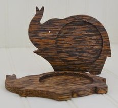 Coasters in the shape of an elephant
                  made of palmwood