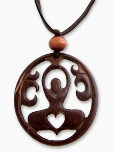 Jewelry made
                  of coconut shell, a pendant showing meditation and
                  heart chakra