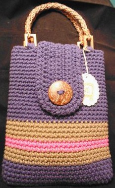 bag with coconut fiber handles and
                  big coconut shell button