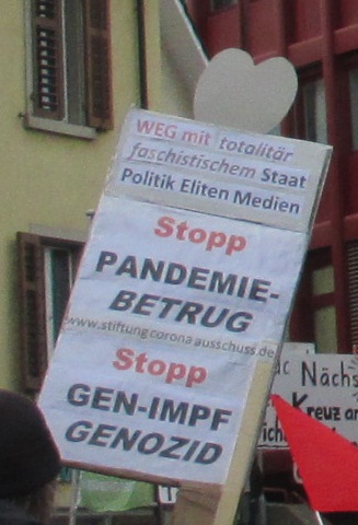 Demo in Z�rich-�rlikon 19.2.2022 30: Plakat
                  "Stopp Pandemiebetrrug+GENimpf-Genozid"