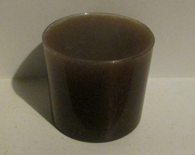 A
                                little cup of noni juice from this
                                bottle 02