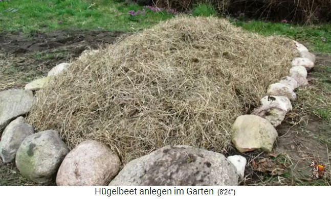Construction of a
              hill bed with stone rim of Bio Garden Kingdom
              (biogartenreich.de)