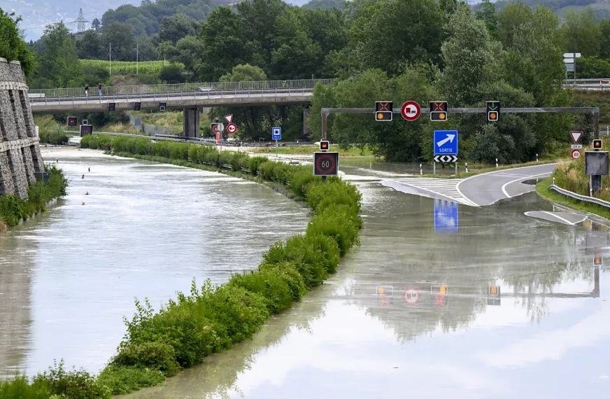Canton of Valais (Switzerland): Flooded
motorway which was built in the alluvial zone of
Rhone River, June 30, 2024 Canton of Valais
(Switzerland): Flooded motorway which was built in
the alluvial zone of Rhone River, June 30, 2024