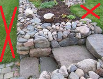 Wide dry stone wall in the
                                    garden with sterile lawn - there
                                    should be lean bloomy meadow