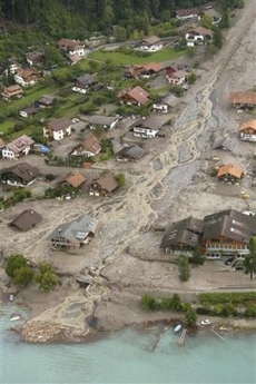 Brienz
                        (Switzerland): A flood was coming: The wild
                        creek needed it's space: houses away, chalets
                        away, and the engineers and architects are not
                        punished for their negligence (August 2005).