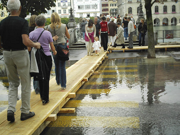 Flood in Switzerland of 2005
                          in Lucerne: little bridge in the floods