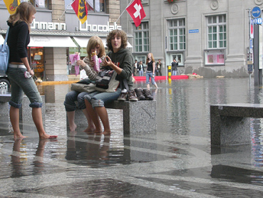 Flood in Switzerland of 2005
                          in Lucerne: banks and a cake shop in the
                          floods