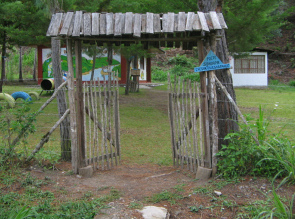 Entrance gate 04 to the
                          playground of Tsachopen in the region of
                          Oxapampa, Peru