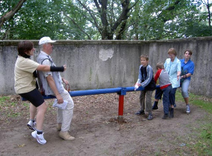 One more seesaw charged by adults at
                              Mueggel Lake in Germany