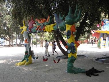 Group of swings 04 at Brazil Square
                                (plaza Brasil) in Santiago in Chile with
                                a great gate-like multicolored form.
                                Interpretation is up to everybody