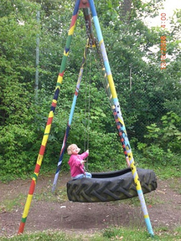 Big tire swing 08 in the day nursery
                            "L�wenbr�cke" ("Lion
                            Bridge") in Wuerzburg, Germany