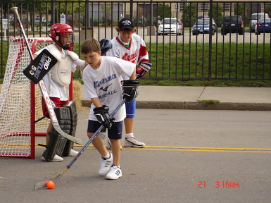 Street Hockey 01 with
                              an orange ball, no location,
                              photobucket.com