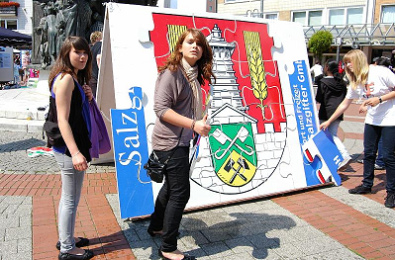 Fiesta en el parque
                              infantil 16, puzzle del escudo municipal,
                              empresa "Sport und Freizeit
                              Salzgitter GmbH", Alemania