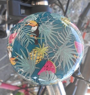 Veloglocke /
                Fahrradklingel Tropenwald mit Ananas, Melone und
                Tukan-Vogel