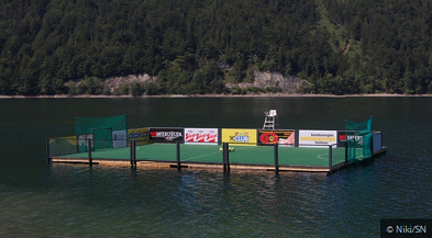 Water plays 02, a
                              soccer raft on Hintersee ("Behind
                              Lake") near Salzburg in Austria,
                              every year they perform a "Raft
                              Soccer Cup" there
