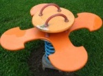 Balanc�n
                                          de muelle bello 05 para 4
                                          ni�os mostrando una flor,
                                          Ibbenbueren, Westfalia,
                                          Alemania